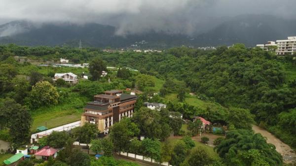 A la foto es mostra l'objecte Pleasant Tree Hotels - Luxury Stay Amidst Nature situat a la ciutat de Rājpur.