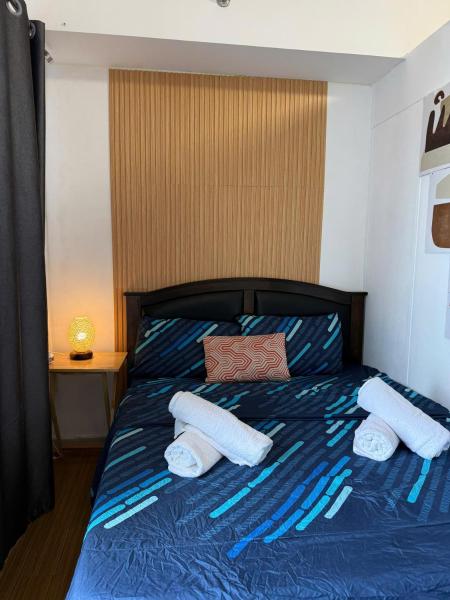 A la foto es mostra l'objecte Cozy TriG Place near BGC at Grace Residence situat a la ciutat de Manila.
