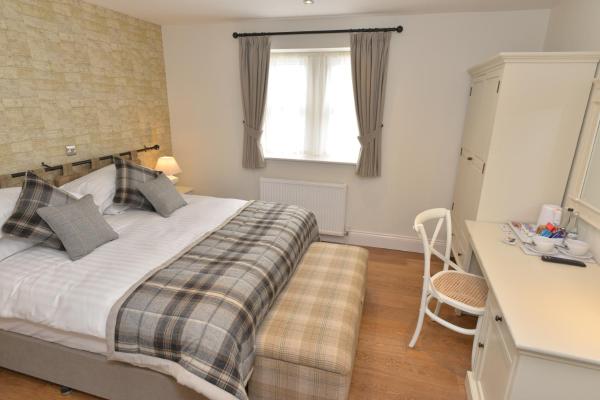 A la foto es mostra l'objecte The Woolly Sheep Inn situat a la ciutat de Skipton.