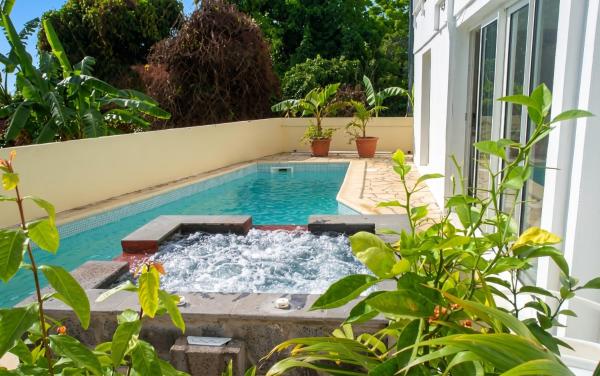 Appartement élégant à Bois De Nèfles, Saint Paul avec jacuzzi.