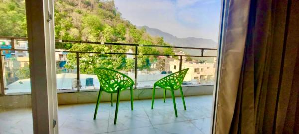 På billedet ses objektet Yogvan Luxury 1BHK Apartments Tapovan Rishikesh beliggende i byen Rishikesh.