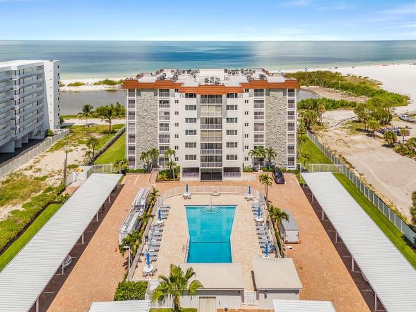 Beachfront Escape With Pool & Island Fun Steps From The Sand - Sand Caper 509 - Roelens - Fort Myers Beach, FL