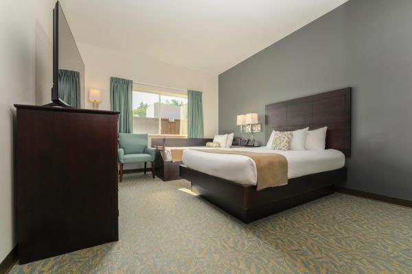 Pokoj Deluxe s manželskou postelí Queen — 28 m² - Sun & Ski Inn and Suites