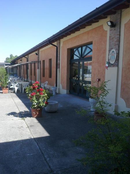 En la foto se muestra el objeto Le Magnolie Agriturismo ubicado en la ciudad de Cigole.