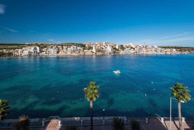 Blue Harbour Seafront with large terrace with panoramic sea views - by Getawaysmalta