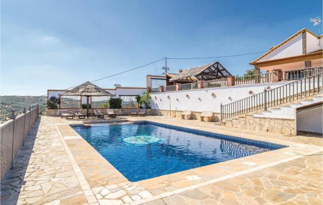 Nice home in Iznájar w/ Outdoor swimming pool, WiFi and 4 Bedrooms