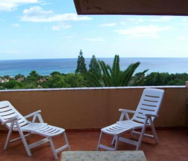 House with 2 bedrooms in Costa Rei with wonderful sea view and terrace 300 m from the beach