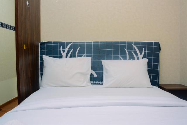Beautiful 2BR with Direct Access to Pool Green Bay Pluit Apartment By Travelio