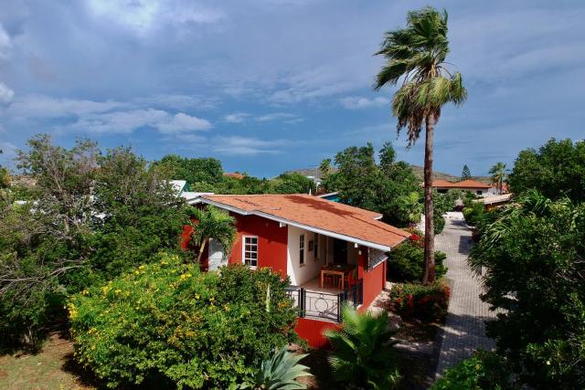 Tropical bungalow in Seru Coral Resort Curacao with beautiful gardens, privacy and large pool