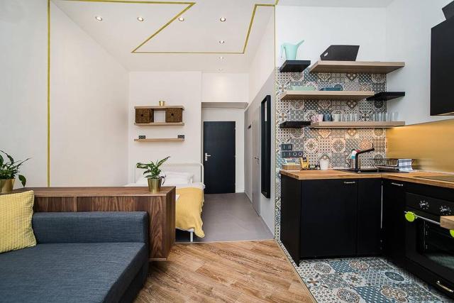 Central designer studio by beautiful park & church