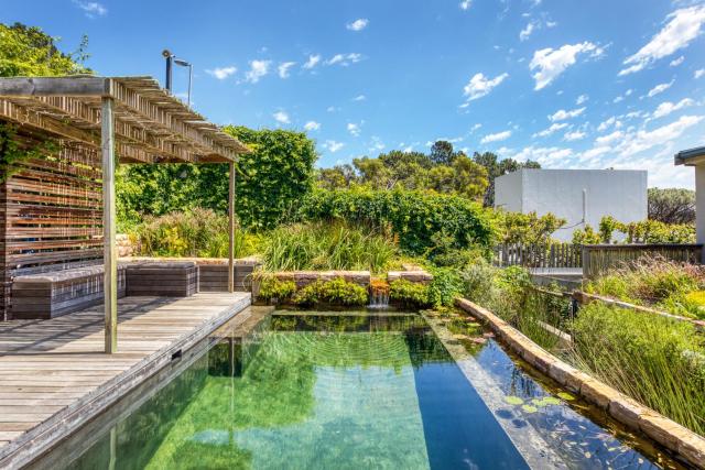 Solar-Powered Mountain Retreat with Natural Pool