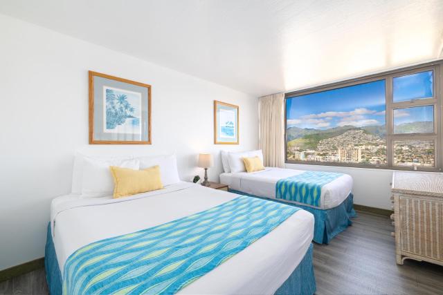 Waikiki Escapade Mountain Views Condo, Steps to Beach with Parking Perk
