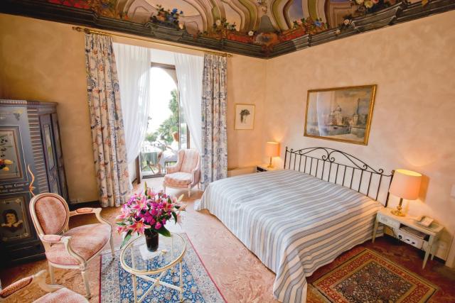 Hotel Castello Seeschloss, lake & pool castle