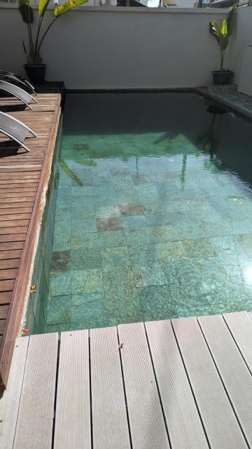 Spacious 2-bedroom apartment with shared pool 2 mins to Pereybere beach