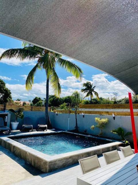 Villa Bois de couleur Piscine et Toit Terrasse