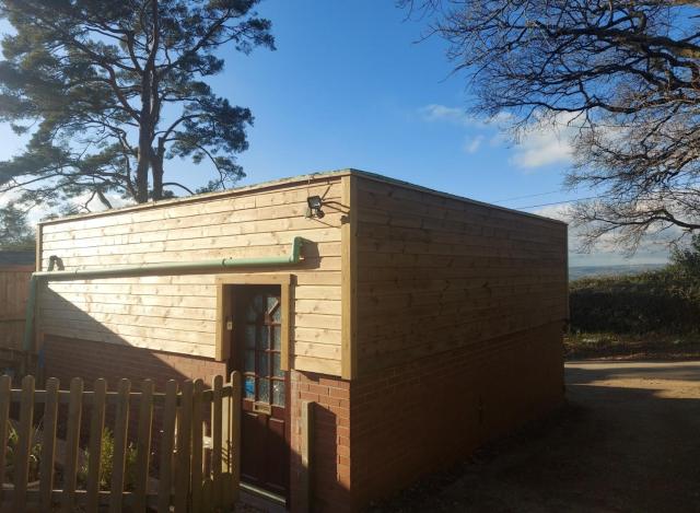 Detached Studio Apartment near Lyme Regis with Kitchen, Dining area, Settee & Chair Sofabed - Kingsize Bed with En-Suite - Dog Friendly - Free WiFi & Parking - Tea Room opposite serving local produce