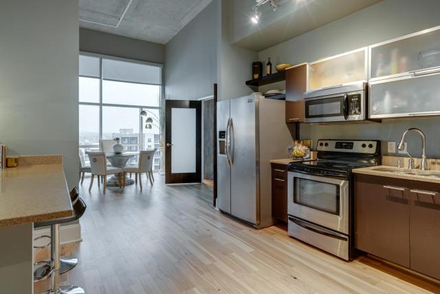 Lux living in this 6th floor condo located in East Nashville minutes to downtown