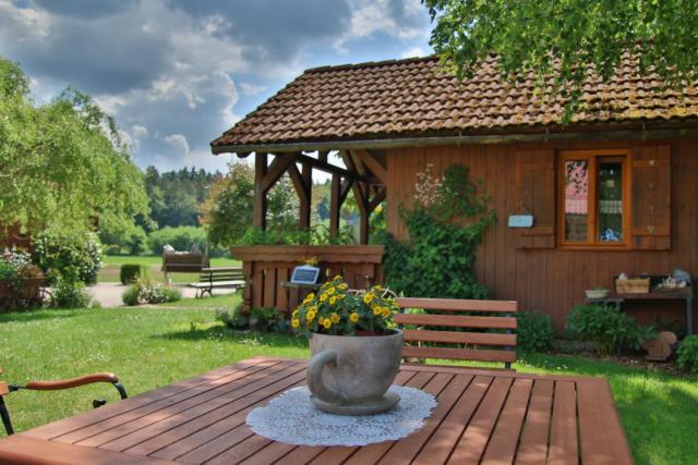 Heumanns Blockhaeuser am Wald