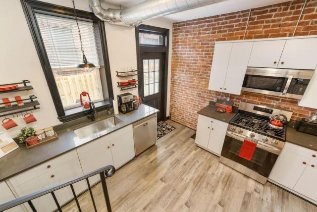 HostWise Stays - Prime Location in Lawrenceville, Exposed Brick 2BR Home