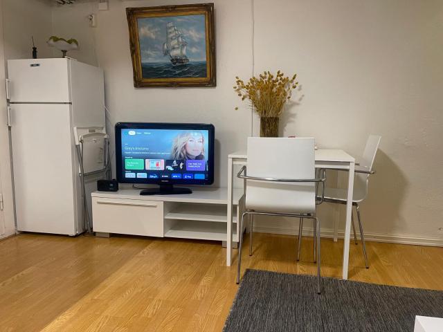 Nice Apartment with1 bedroom Separate living room with a sofa bed and a tiny kitchen a bathroom located in Nordstrand near by the Sea for 3 guests with a garden and grill with sea view just outside the apartment