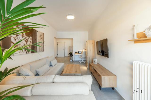 Modern Mythic Flat with Greek-Inspired Artistic