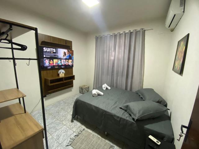 Quarto privativo no centro de Foz
