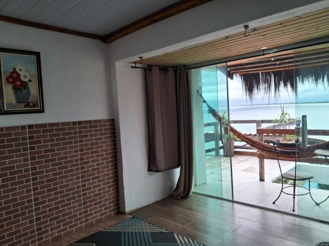 Pousada Marambaia Café - Praiana, econômica, Com café da manhã, piscina e hidromassagem ao ar livre - Frente para o mar