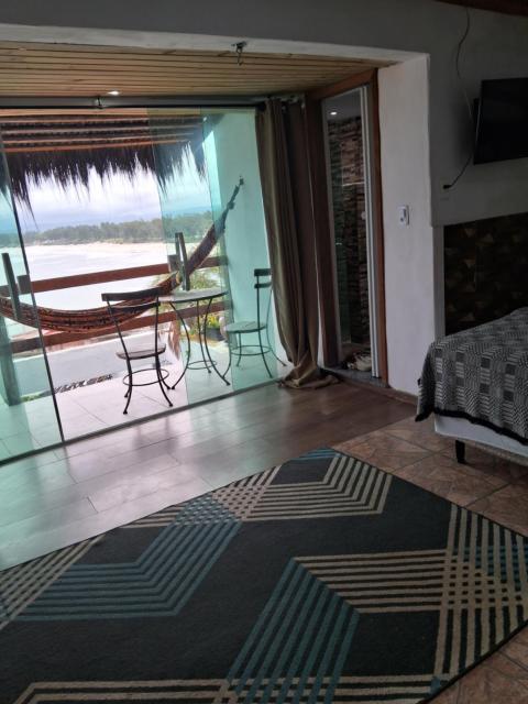 Pousada Marambaia Café - Praiana, econômica, Com café da manhã, piscina e hidromassagem ao ar livre - Frente para o mar