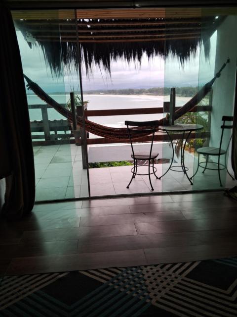 Pousada Marambaia Café - Praiana, econômica, Com café da manhã, piscina e hidromassagem ao ar livre - Frente para o mar