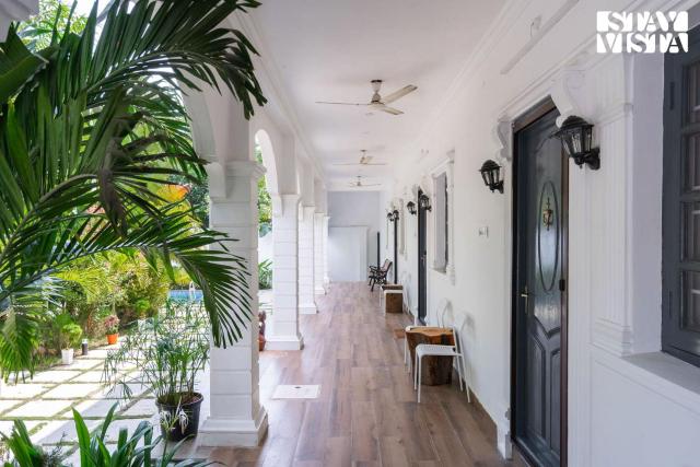 Agam Villa by VEO, StayVista - 5BHK with Shared Pool & Lawn