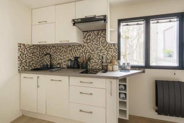 Central & Stylish 1BD Duplex w GardenMontmartre!