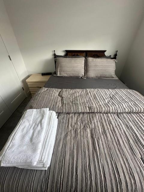 Spacious 2 BR & Kitchen Basement Apartment near Airport