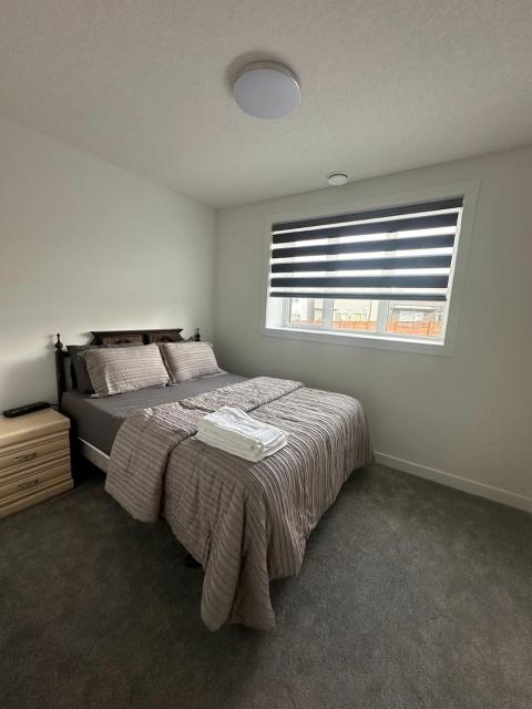 Spacious 2 BR & Kitchen Basement Apartment near Airport