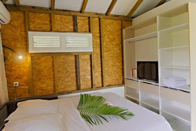 Bungalow à petit Macabou piscine & plage à proximité