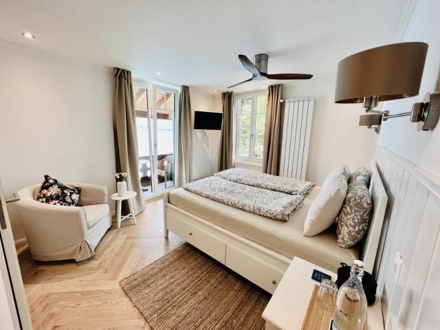 Boutique Hotel Niesenblick - direkt am Thunersee gelegen mit SELF CHECK IN & digitaler Rezeption