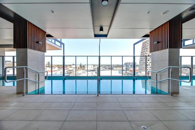 City Serenity 2BR Apt with Pool, Gym, Steam, Sauna