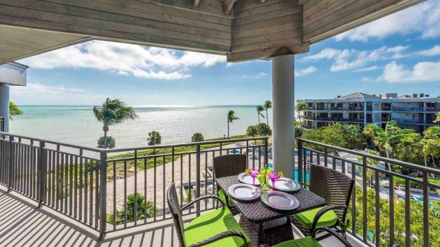 Neptunes Penthouse by Last Key Realty