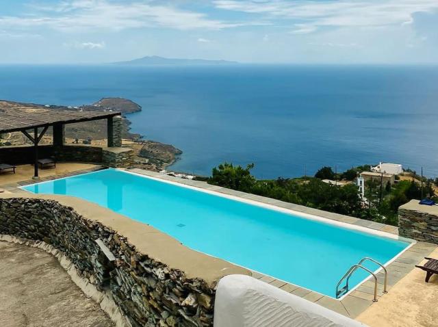 Andros -Stone house with shared pool & seaview