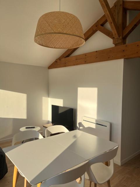 Maisonnette avec parking privé et local à velos