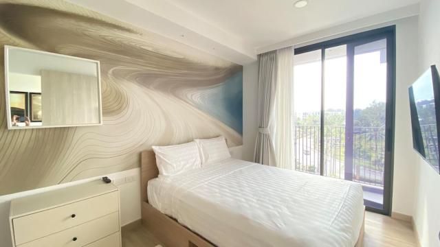1BDR Skypark Laguna 10 min to the Sea Roof Pool