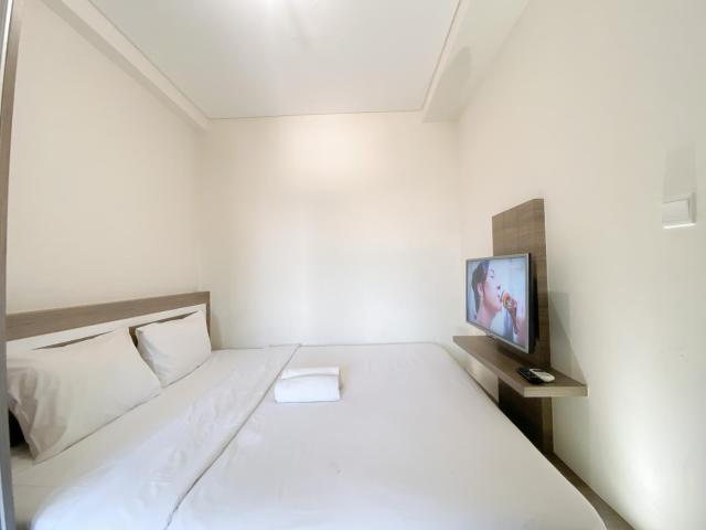Strategic 2BR Apartment with Pool View at Parahyangan Residence By Travelio
