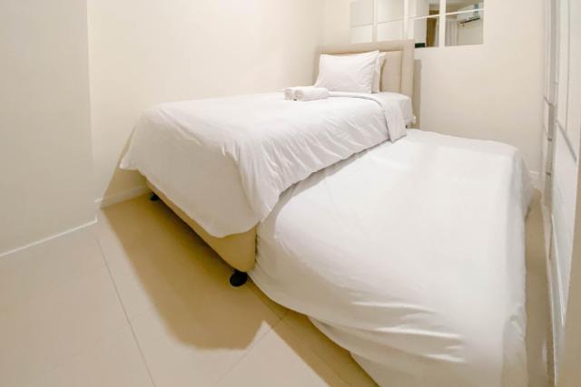1BR with Direct Access to Pool at Parahyangan Residence Apartment By Travelio