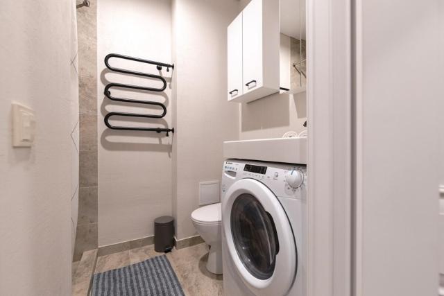 Stylish white salad studio near the city center