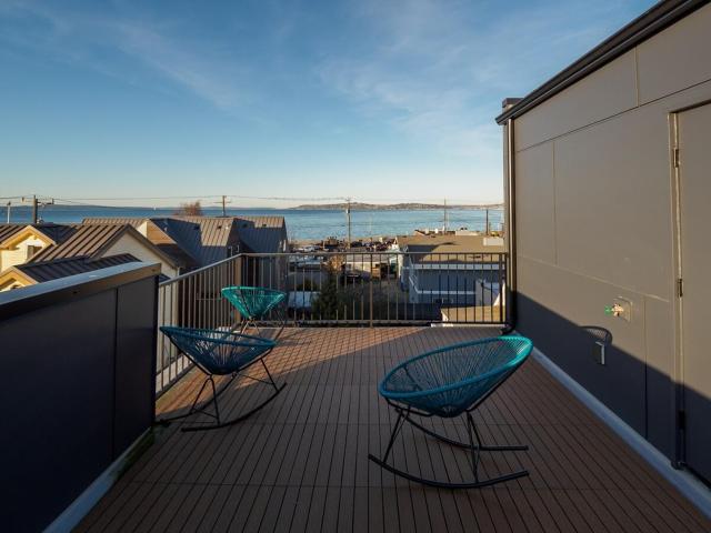 Steps to Alki Beach with Water Views Rooftop deck