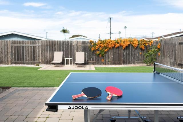 Surf Farmhouse | Hot Tub, Big Backyard, Sleeps 7!