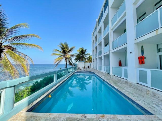 Coastal View Beach Front Apartment with Pool