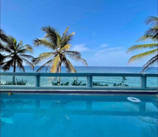 Sea View Beach Front Apartment with Pool