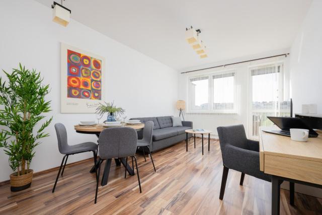 Spacious Apartment with Parking and Balcony by Noclegi Renters