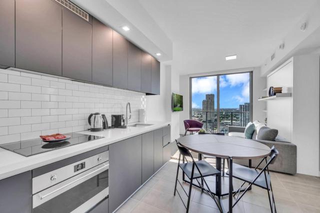 Stylish Studio and Den Across from Bayside Miami