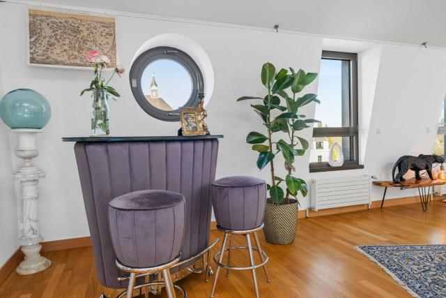 160m2 Penthouse in the City Centre with a balcony and the city view